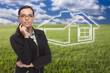 Image showing Woman and Grass Field with Ghosted House Figure Behind