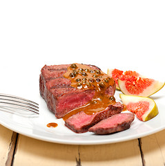 Image showing green peppercorn beef filet mignon