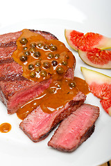 Image showing green peppercorn beef filet mignon