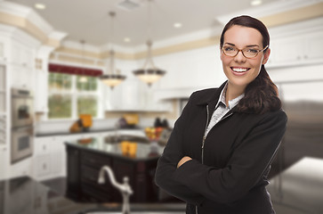 Image showing Mixed Race Young Woman Standing in Beautiful Custom Kitchen