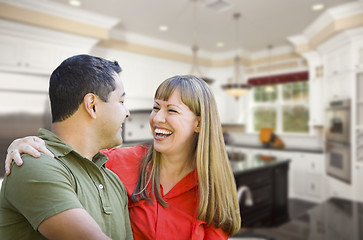 Image showing Mixed Race Couple Inside Beautiful Custom Kitchen