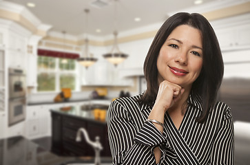 Image showing Hispanic Woman Standing in Beautiful Custom Kitchen