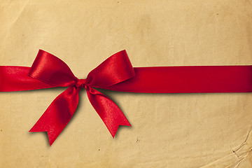 Image showing Red ribbon and cartoon box