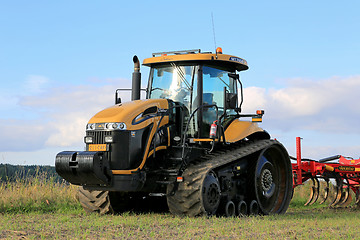 Image showing Challenger Agricultural Crawler Tractor on Field in Autumn