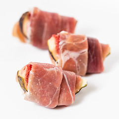 Image showing Slices of figs in Prosciutto