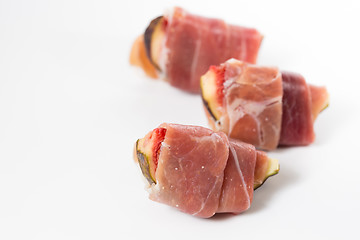 Image showing Slices of figs in Prosciutto