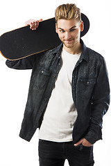 Image showing Young man with a skateboard