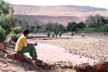 Image showing Moroccon boy near wadi