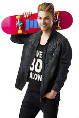 Image showing Young man with a skateboard