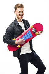 Image showing Young man with a skateboard