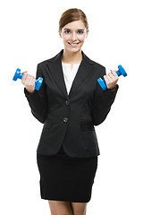 Image showing Business woman lifting weights