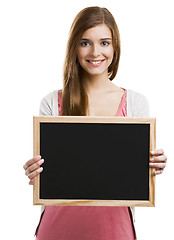 Image showing Girl holding  a chalkboard