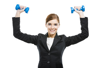 Image showing Business woman lifting weights