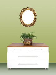 Image showing Modern chest of drawers and gilded Frame on wall