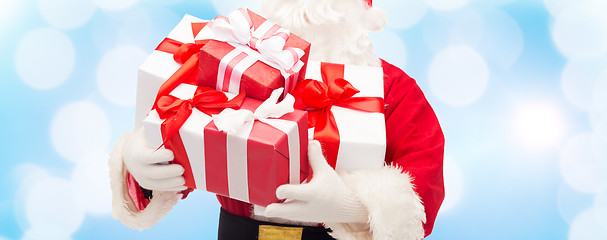 Image showing close up of santa claus with gift box