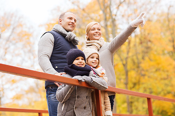 Image showing happy family in autumn park