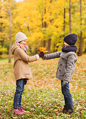 Image showing smiling children in autumn park