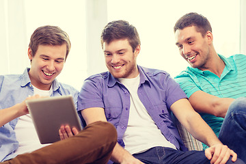 Image showing smiling friends with tablet pc computers at home