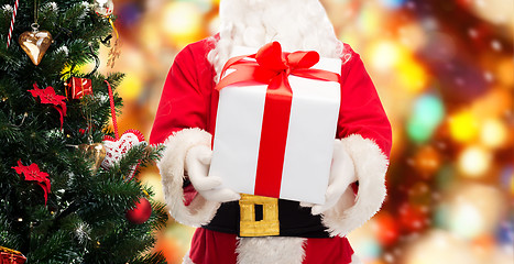 Image showing man in costume of santa claus with gift box