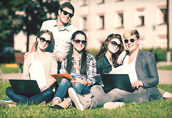 Image showing students or teenagers with laptop computers