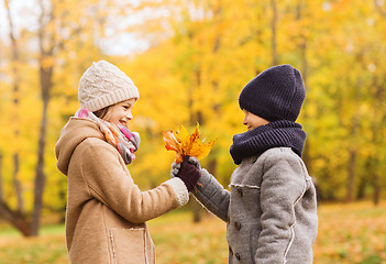 Image showing smiling children in autumn park