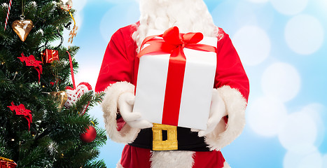 Image showing man in costume of santa claus with gift box