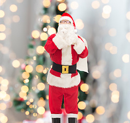 Image showing man in costume of santa claus with bag