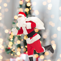 Image showing man in costume of santa claus with bag