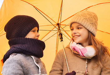 Image showing close up of smiling children in autumn park