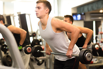 Image showing group of men with barbells in gym