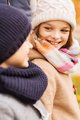 Image showing close up of smiling children in autumn park
