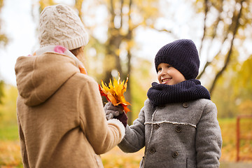 Image showing smiling children in autumn park