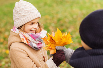 Image showing smiling children in autumn park