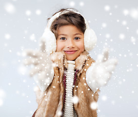 Image showing happy littl girl in winter clothes
