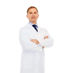 Image showing smiling doctor or professor with crossed arms