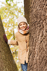 Image showing smiling little girl autumn in park