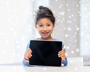 Image showing smiling girl with tablet pc at home