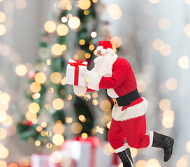 Image showing man in costume of santa claus with gift box