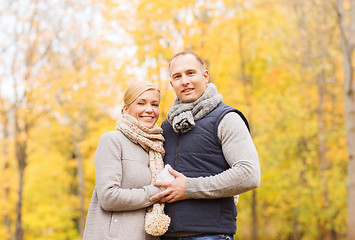 Image showing smiling couple in autumn park