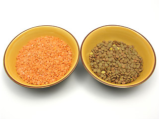 Image showing Two bowls of ceramic with lentils and red lentils