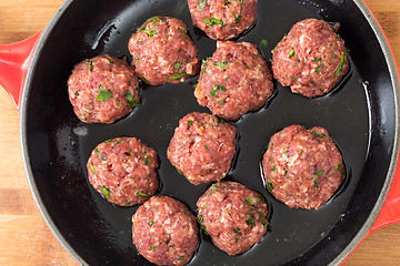 Image showing Frying meatballs from above