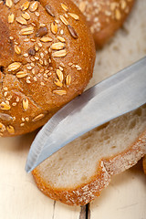 Image showing organic bread over rustic table