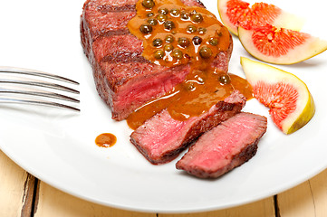 Image showing green peppercorn beef filet mignon