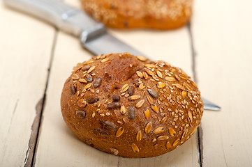 Image showing organic bread over rustic table