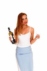 Image showing Woman serving wine.