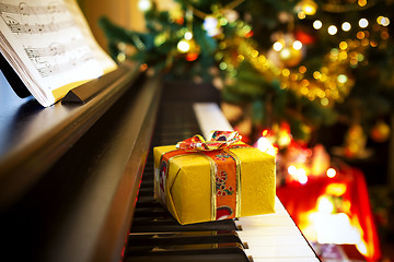 Image showing Christmas gift on piano