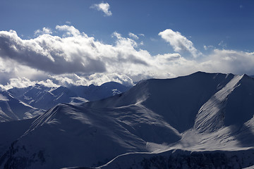 Image showing Silhouette of winter mountains at evening