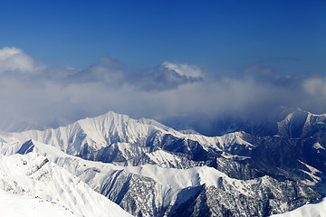 Image showing Sunlight snowy mountains