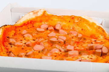 Image showing Takeaway Italian pizza with hot dog