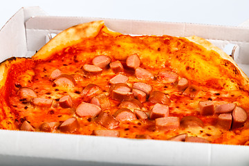 Image showing Takeaway Italian pizza with hot dog